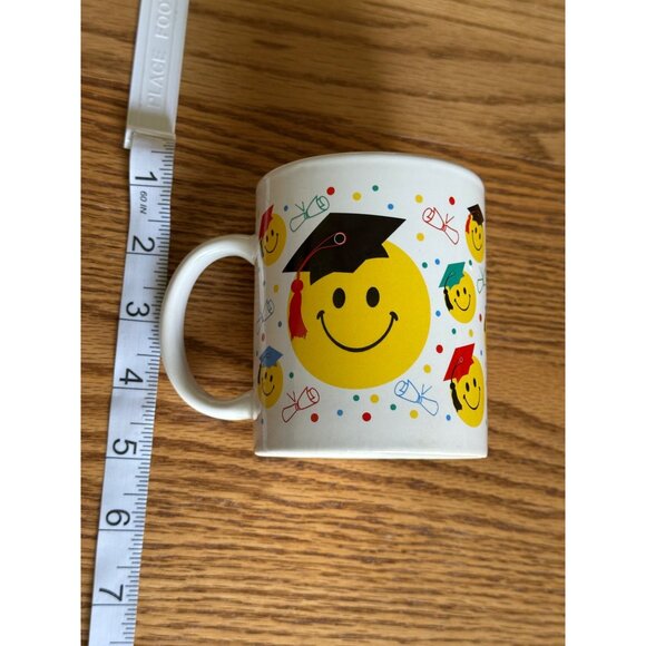 Graduation Smiley Face Mug White Ceramic With Colorful Caps & Diplomas - Picture 5 of 6